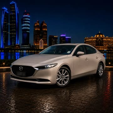 Beige Mazda 3 2026 rental car in Abu Dhabi from Silver Arrow Car Rental